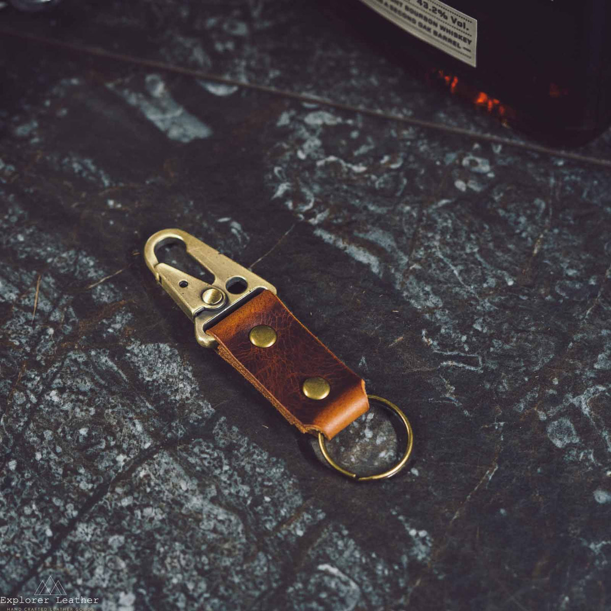 Brown leather key ring with brass clip