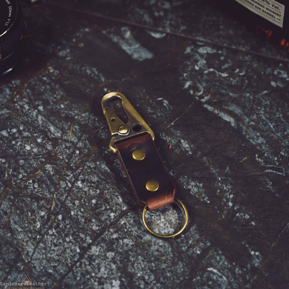 Dark brown leather key ring with brass clip