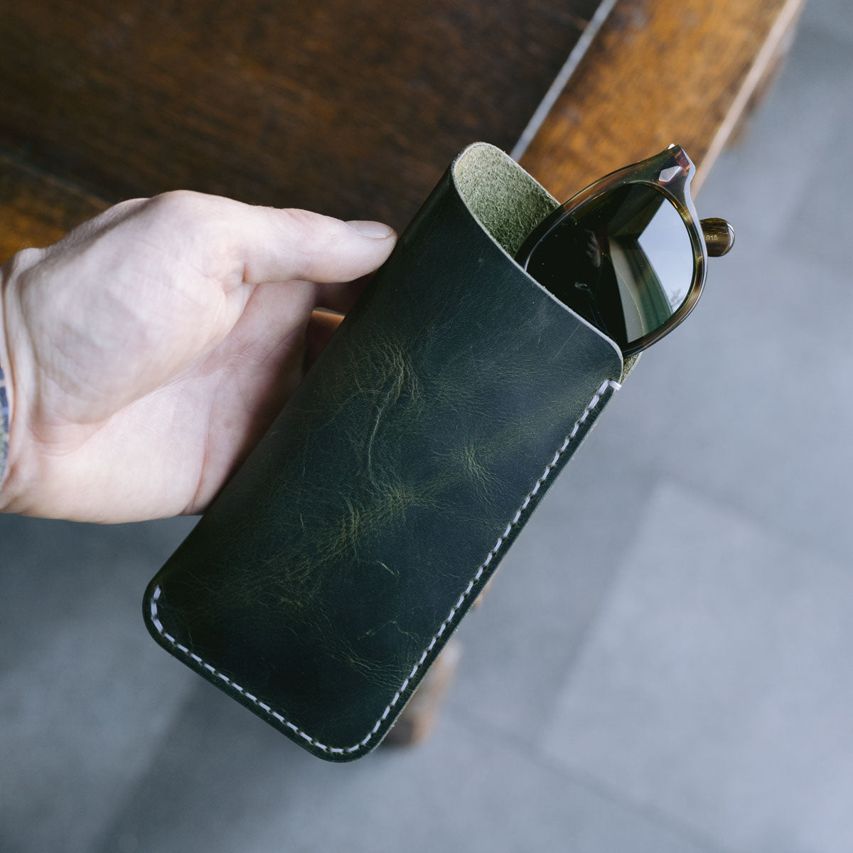 Sunglasses in olive green handmade leather slip case