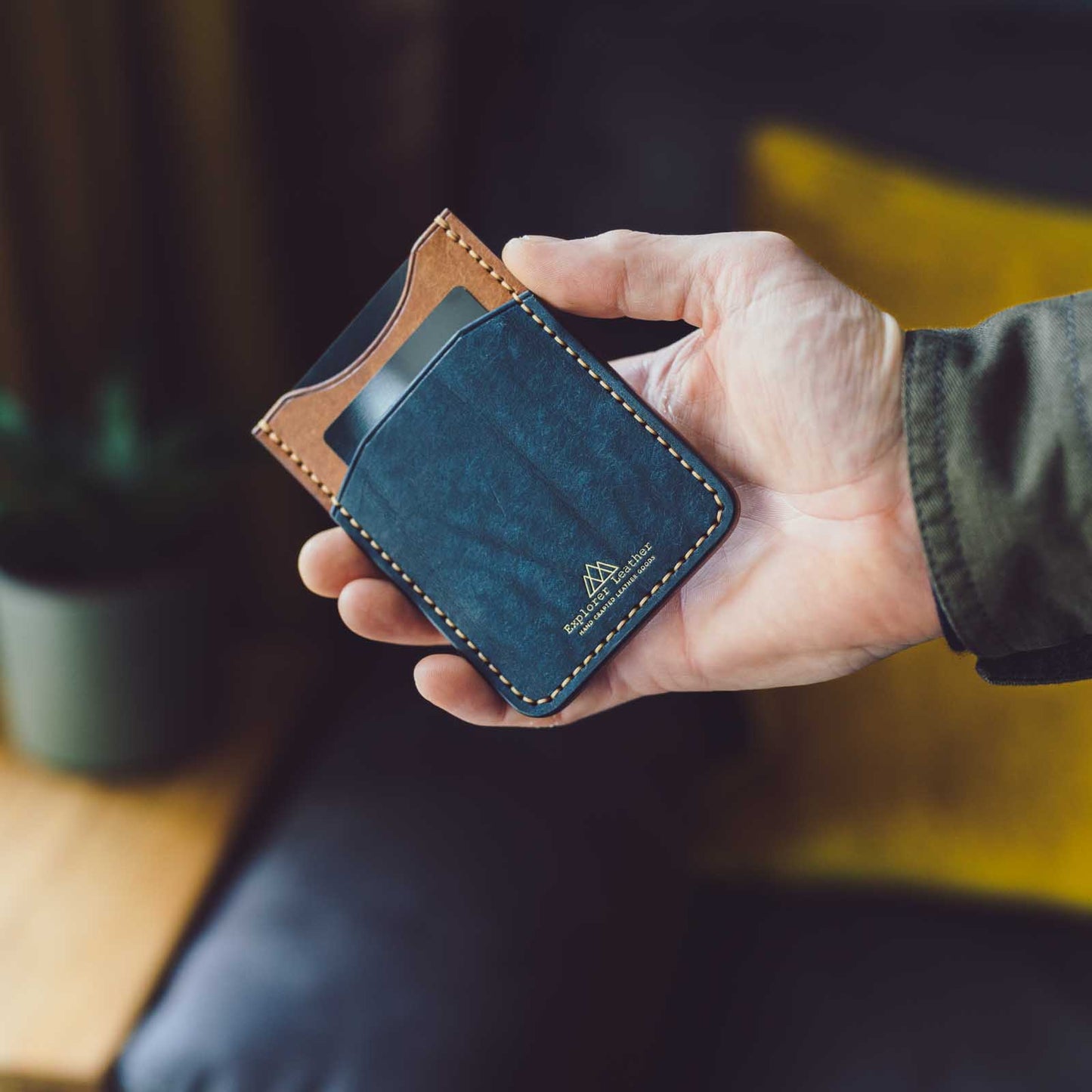 Pueblo card holder in hand