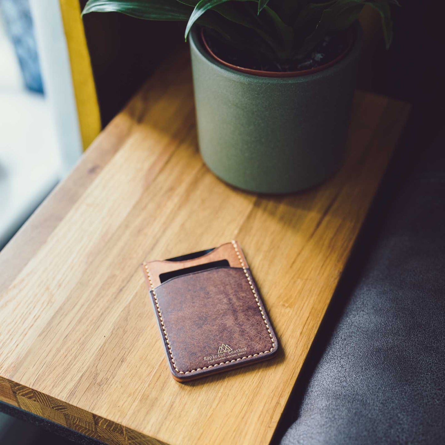 3 pocket card holder on table