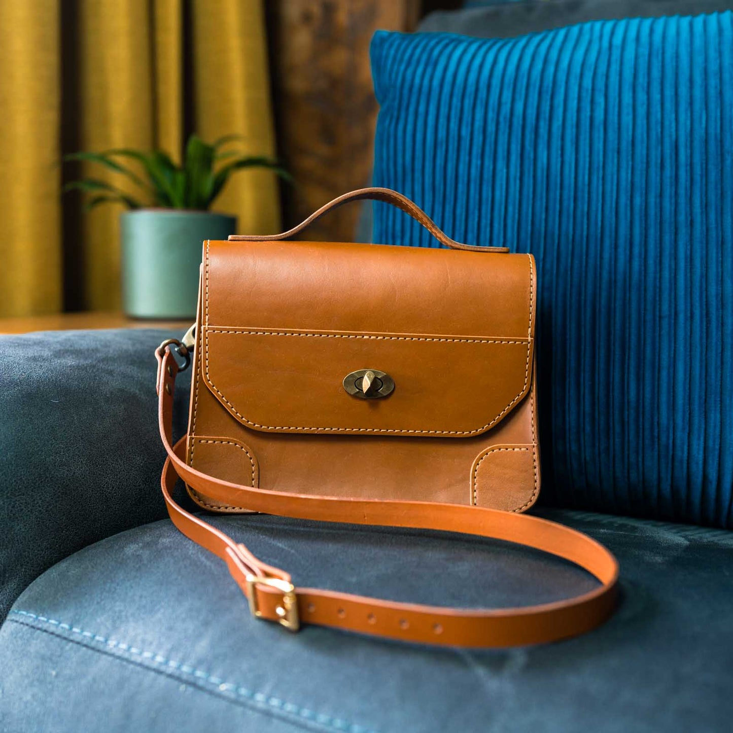 Tan satchel style crossbody bag