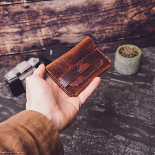 Cognac wax flap card holder in hand