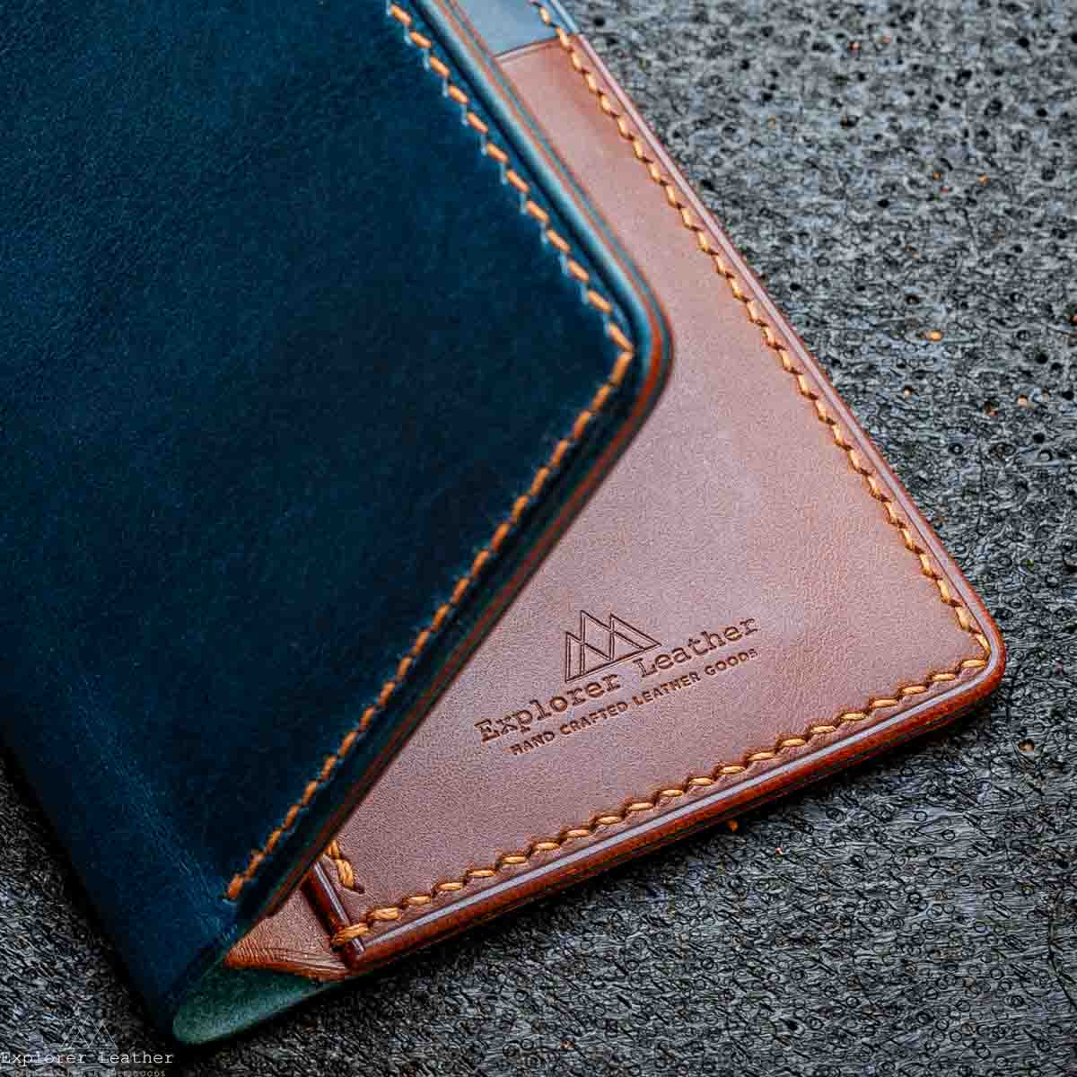 navy blue and brown tan leather wallet, caramel hand stitching, linen thread