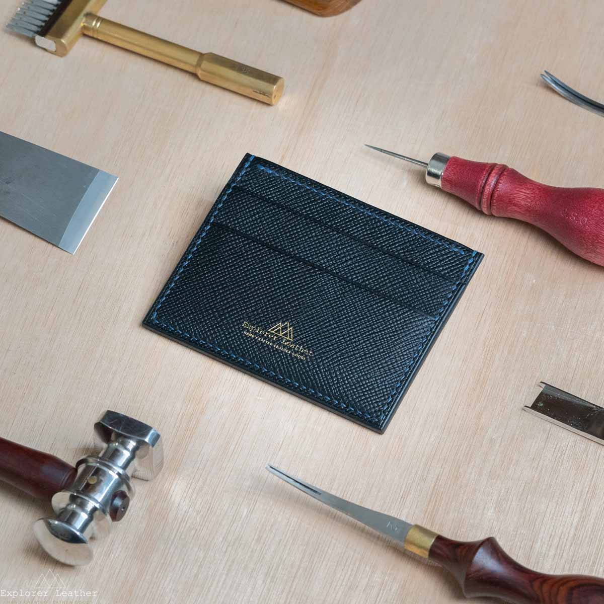 Black, five pocket, card holder, hatch grain, pebble grain. full grain, Italian leather, navy blue stitching 