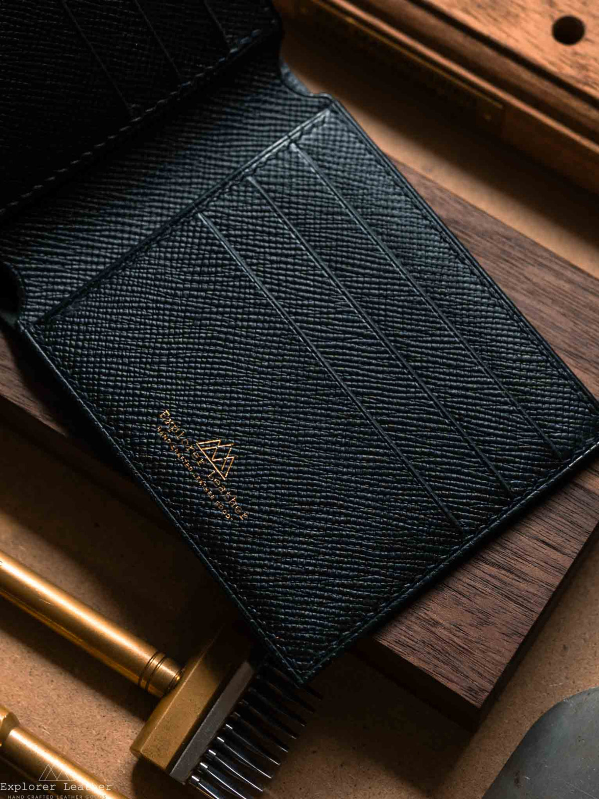 Close view of black leather wallet interior and stitching