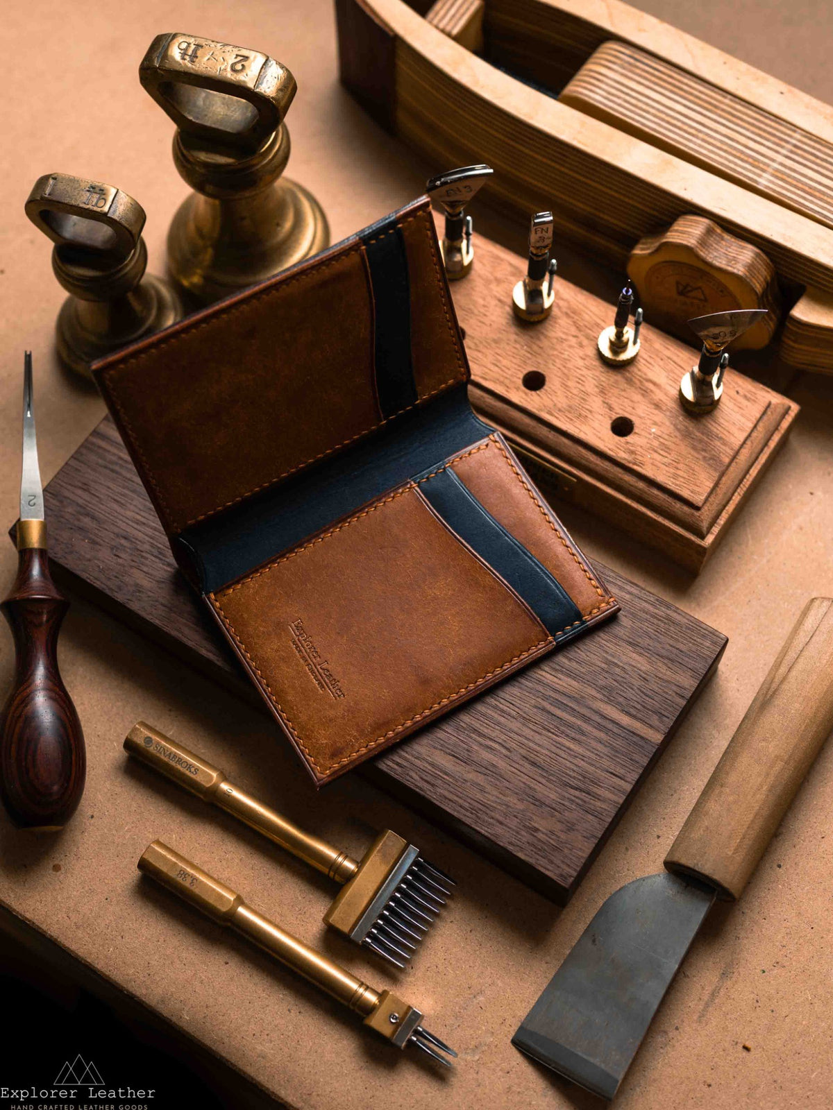 Inside of cognac and navy Badalassi Pueblo vertical bifold wallet
