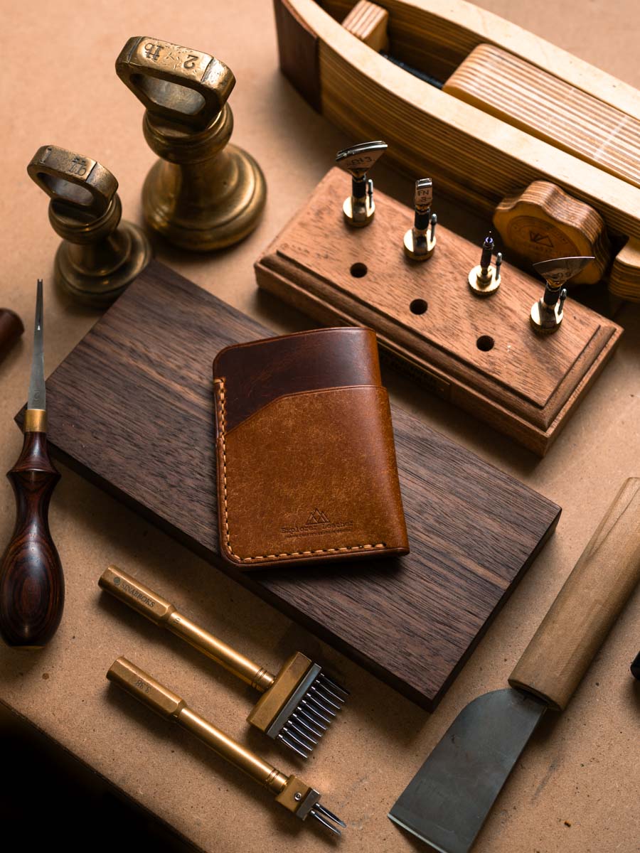 Front of three pocket Cognac leather card holder