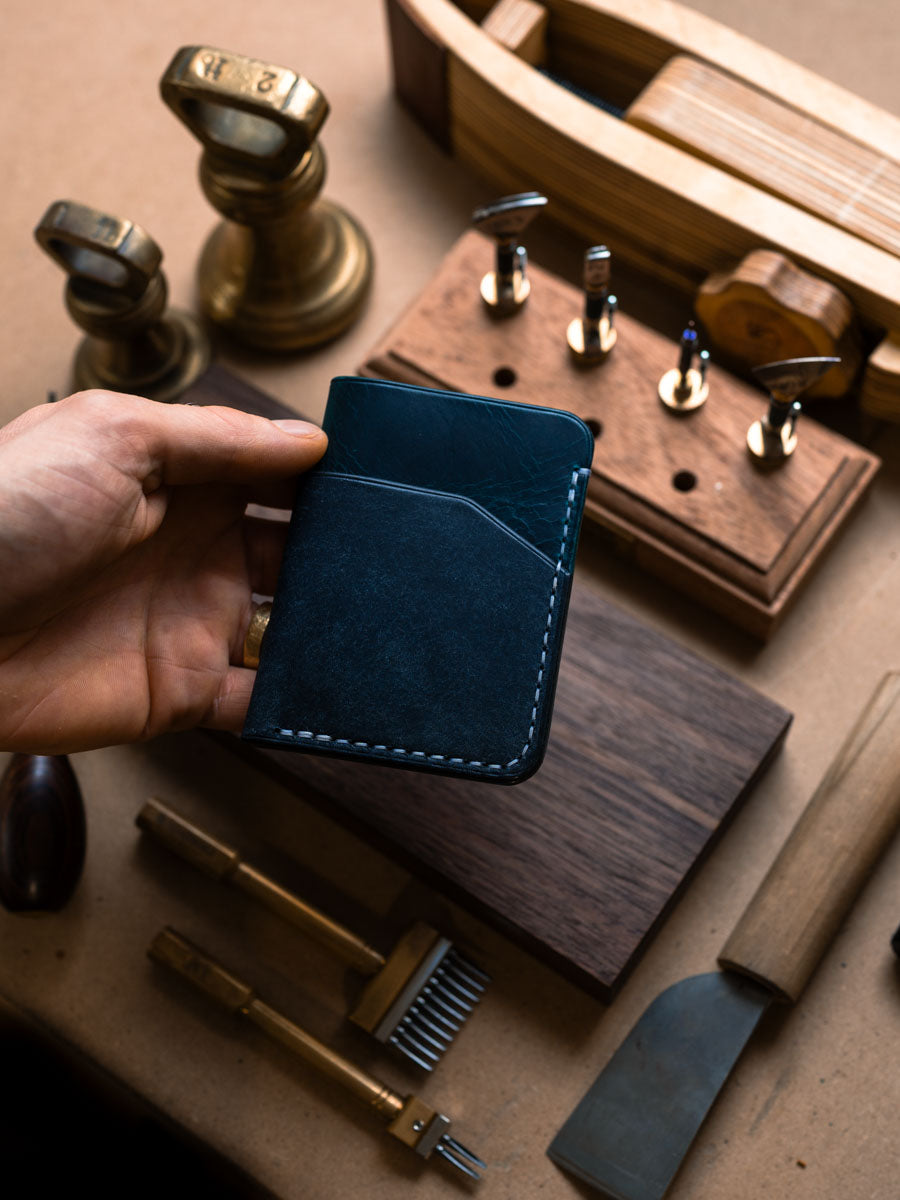 Three pocket card holders in assorted leather colours