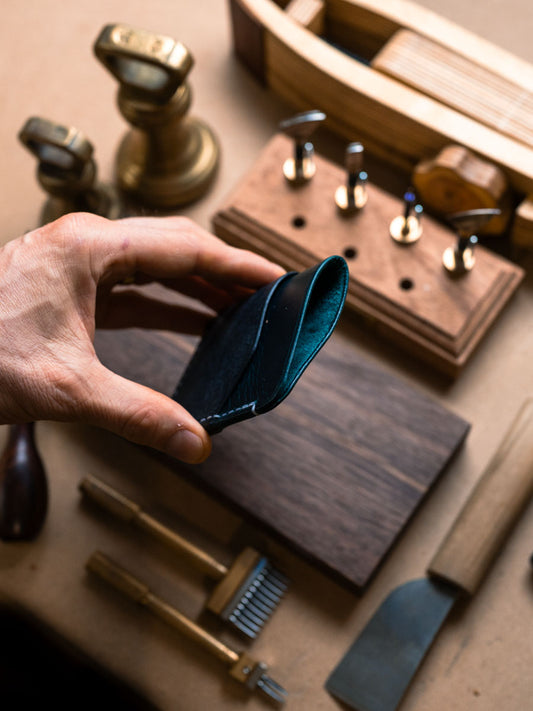 Three pocket card holder held open